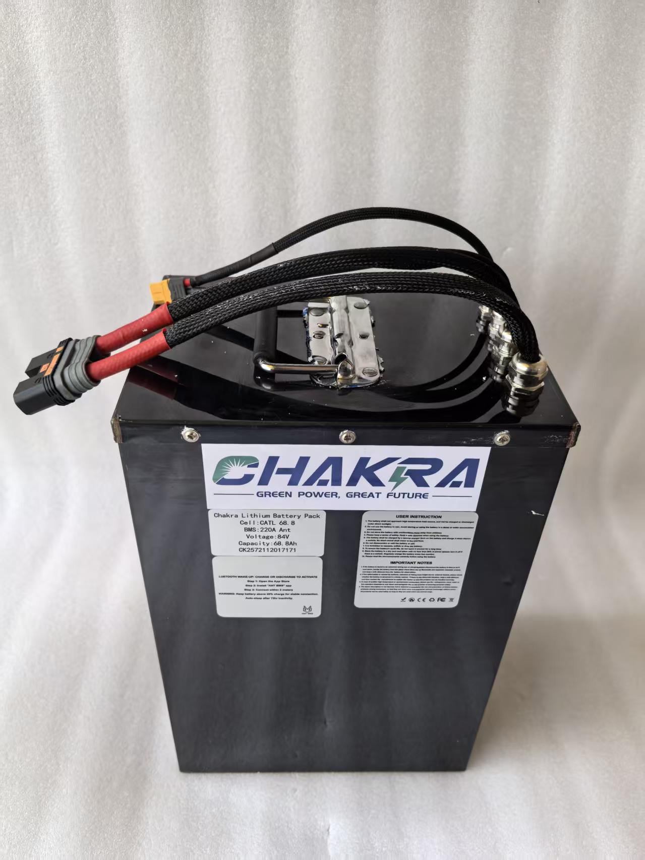 A high-performance electric motorcycle battery built with CATL cells, featuring 84V and 68.8Ah capacity, 150A continuous current output, Bluetooth connectivity, and a 100-mile range. This battery is manufactured at the Chakra battery plant.