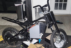 A Razor MX650 with Chakra's 72V battery.