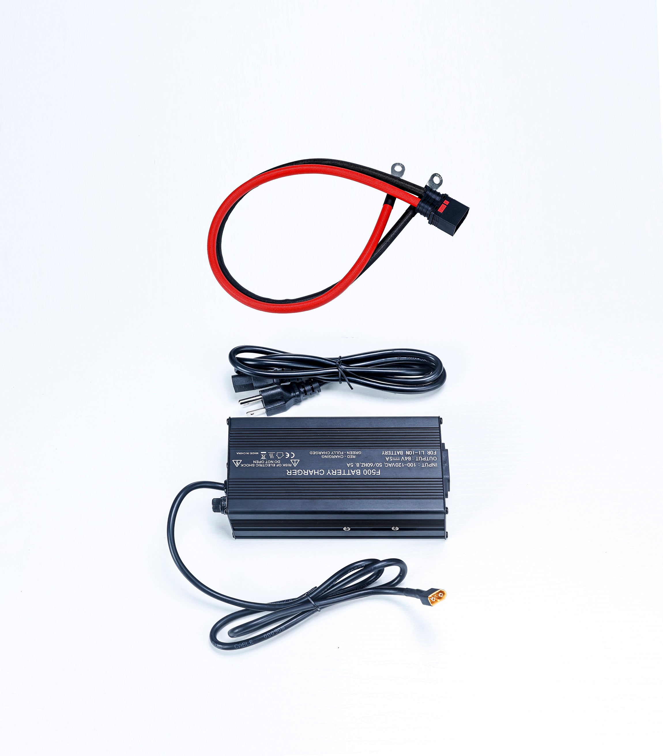The charger and connecting cable provided by Chakra Battery Company